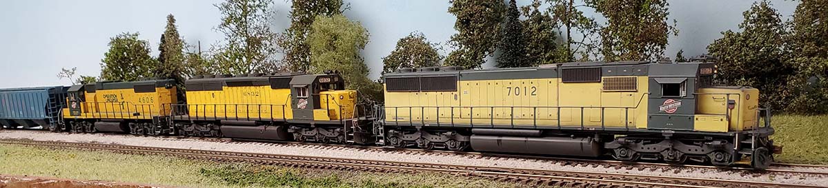 North Platte to Chicago C&NW manifest &lpar;NPCH1&rpar; led by SD50 7012 approaches Freeport Wallace Yard